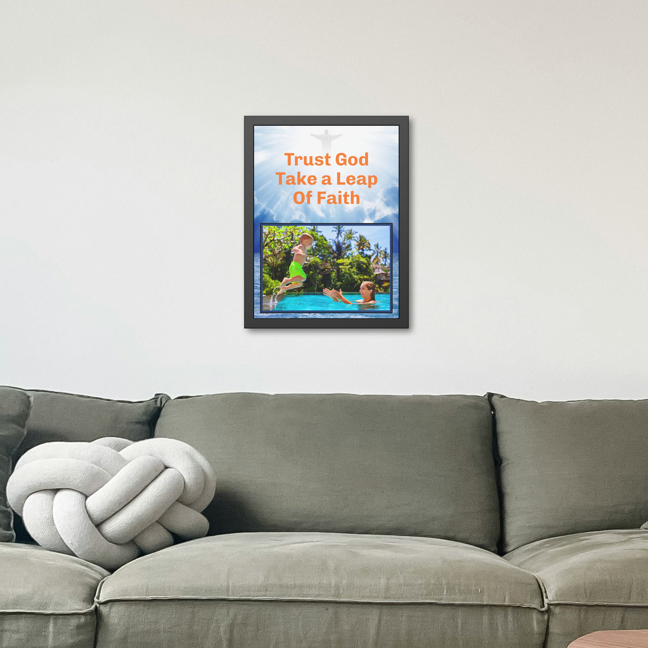 Black wood framed inspirational poster with “Leap of Faith” design, child jumping into pool, with the message "Trust God Take a Leap of Faith," semi-gloss finish, shatter-proof plexiglass, available in 3 sizes, 18x24 framed poster on wall