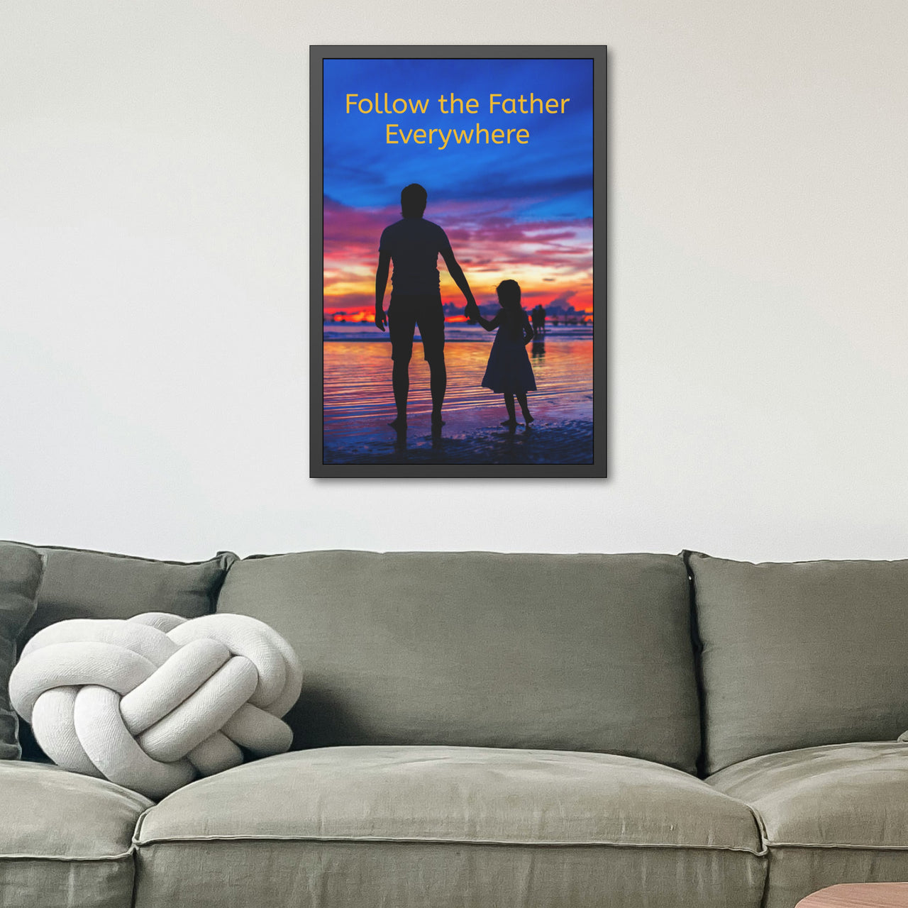 Black wood framed inspirational poster with “Follow the Father” design, child walking with father with the message "Follow the Father Everywhere," semi-gloss finish, shatter-proof plexiglass, available in 3 sizes, 24x36 framed poster on wall
