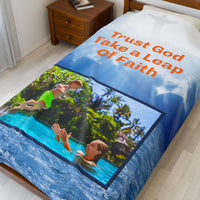Plush velveteen blanket with “Leap of Faith” design, child jumping into pool, inspirational message