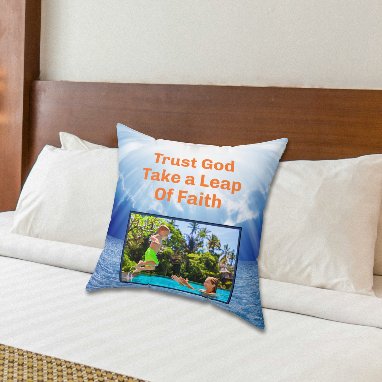 Inspirational throw pillow with “Leap of Faith” design, child jumping into pool, faith-based message "Trust God, Take a Leap of Faith," faith-based home décor, reversible with white or blue back, spun polyester, 4 sizes, 18x18 on bed