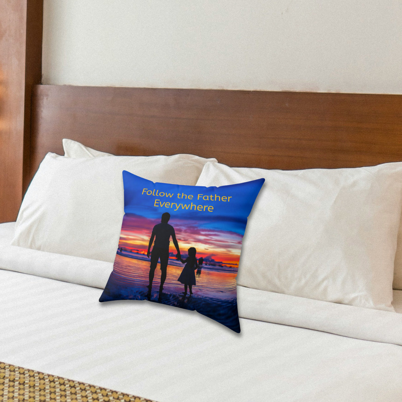 Faith-based throw pillow with “Follow the Father” design, child walking with father, inspirational message "Follow the Father Everywhere, reversible with white or royal blue back, spun polyester, 4 sizes, 14x14 on bed