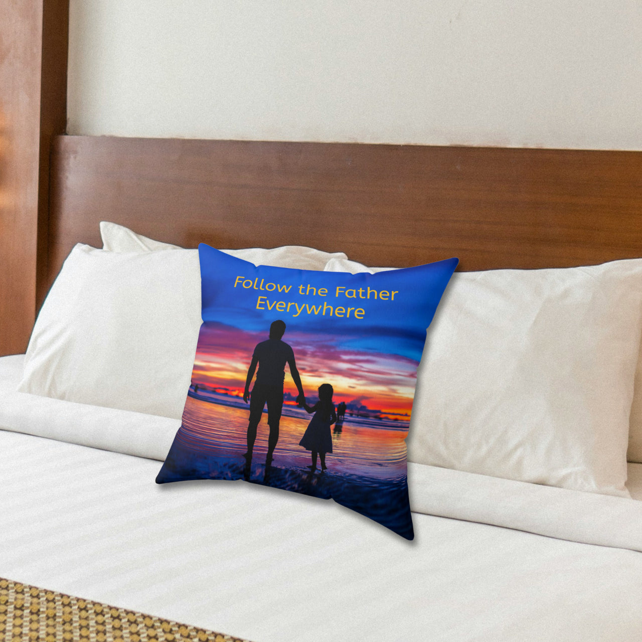 Faith-based throw pillow with “Follow the Father” design, child walking with father, inspirational message "Follow the Father Everywhere, reversible with white or royal blue back, spun polyester, 4 sizes, 16x16 on bed