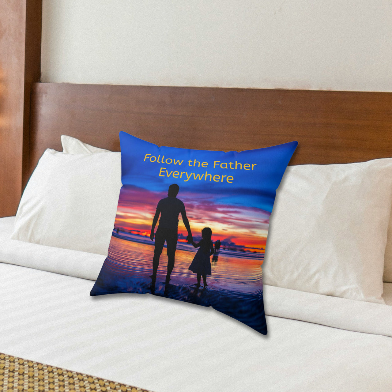 Faith-based throw pillow with “Follow the Father” design, child walking with father, inspirational message "Follow the Father Everywhere, reversible with white or royal blue back, spun polyester, 4 sizes, 18x18 on bed