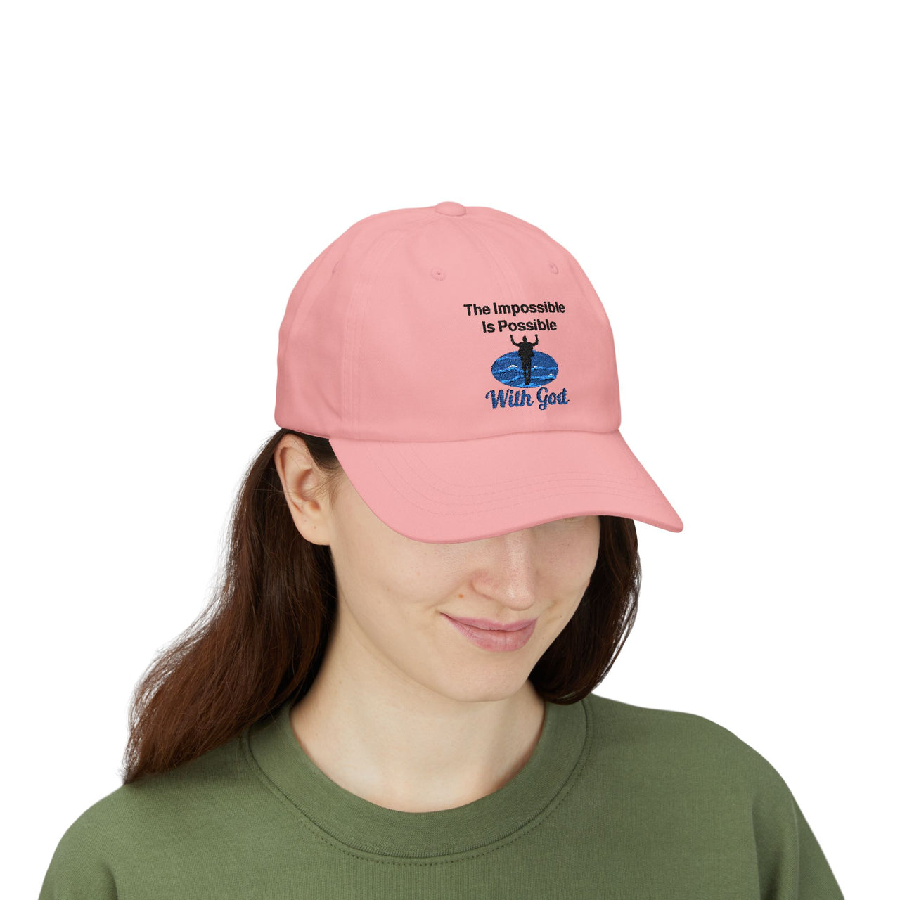 Classic cotton baseball cap with "Impossible Man" design, message “The Impossible Is Possible With God,” adjustable fit, spiritual hat for men walking in faith, woman wearing pink cap