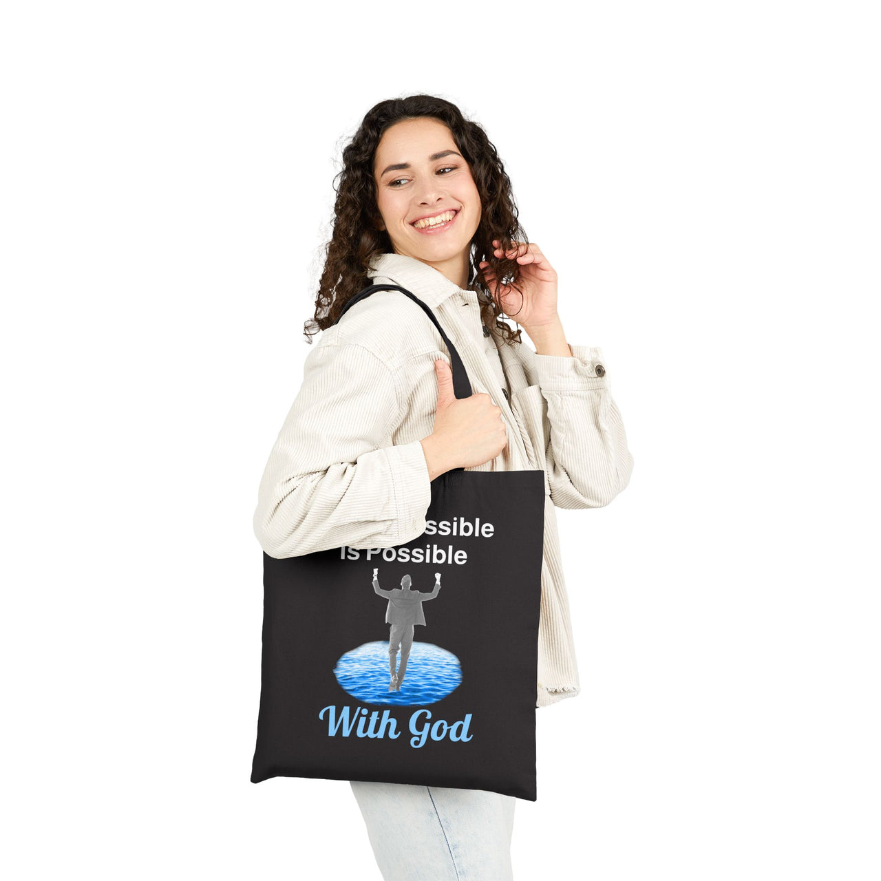 Cotton canvas tote bag with "Impossible Man" design, message “The Impossible Is Possible with God,” printed on both sides, durable spiritual tote bag for men walking in faith, woman carrying black tote bag