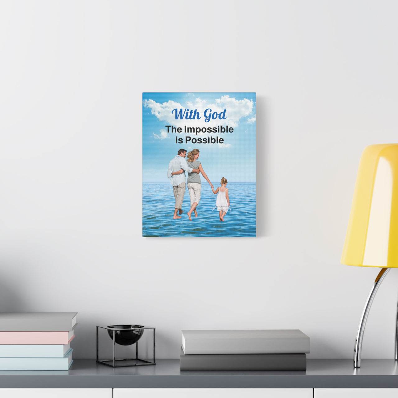Canvas wall art with “Impossible Family” design, family walking on water with the message "With God, The Impossible Is Possible," pinewood frame, inspirational home décor, ready to hang, 11x14 wall art on wall