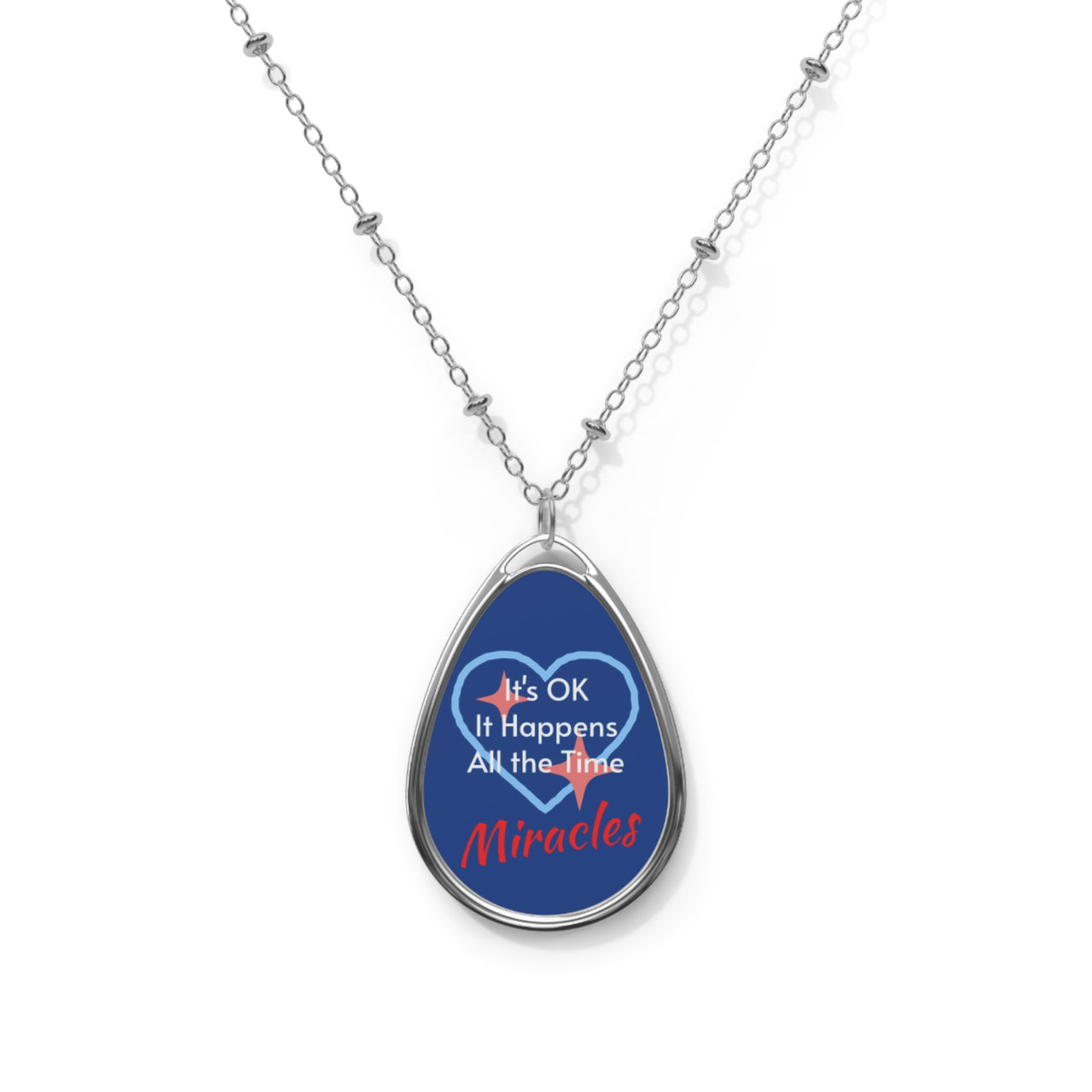 Inspirational oval pendant necklace with "Miracles Happen" design, message “It’s OK. It Happens All the Time – Miracles,” zinc alloy and white aluminum, spiritual jewelry for everyday encouragement, blue pendant