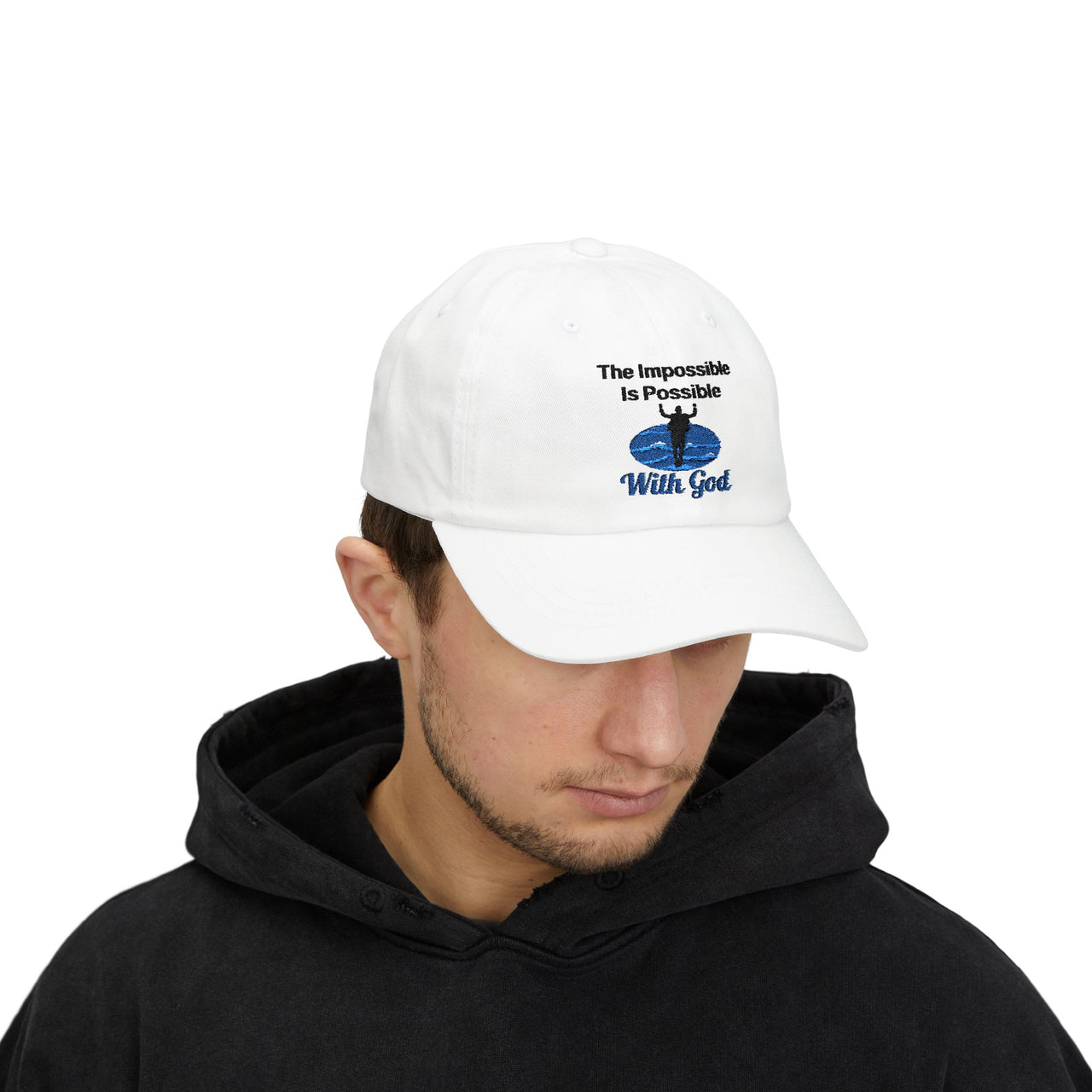 Classic cotton baseball cap with "Impossible Man" design, message “The Impossible Is Possible With God,” adjustable fit, spiritual hat for men walking in faith, man wearing white cap