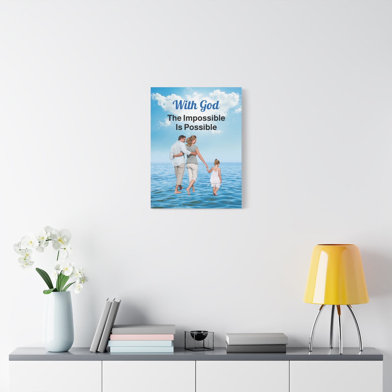 Canvas wall art with “Impossible Family” design, family walking on water with the message "With God, The Impossible Is Possible," pinewood frame, inspirational home décor, ready to hang, 18x24 wall art on wall