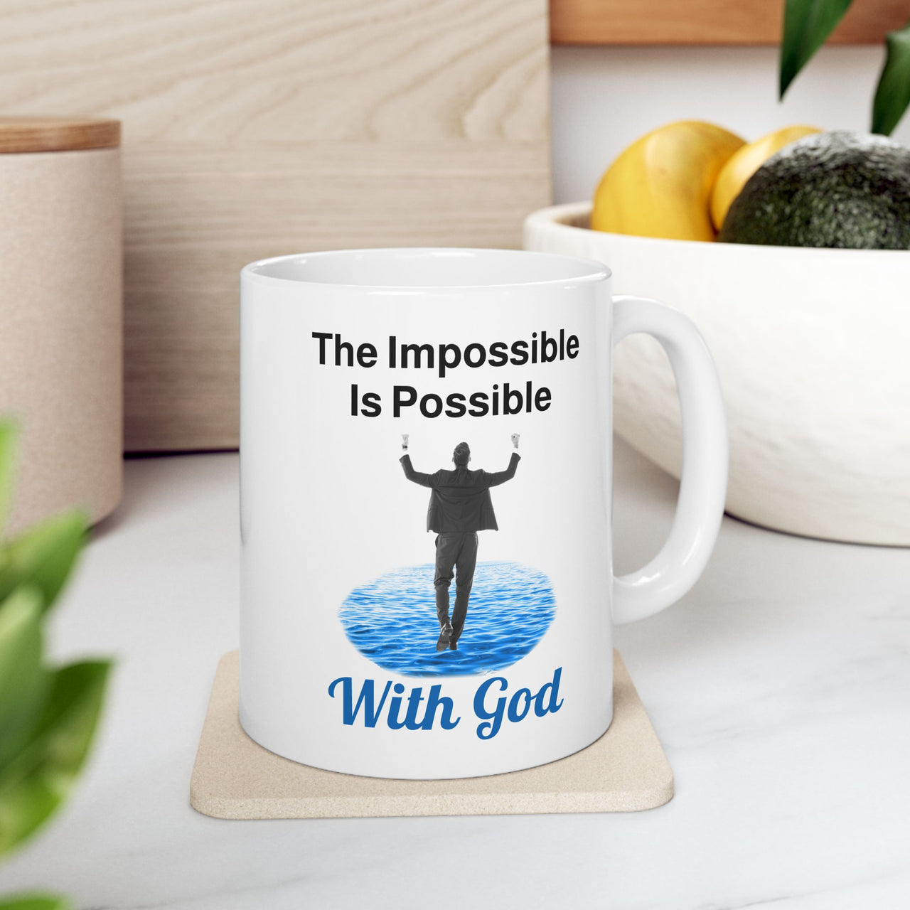Motivational ceramic mug with “Impossible Man” design, man walking on water with the message "The Impossible Is Possible with God," inspirational gift, microwave safe, 11oz and 15oz, 11oz mug on table
