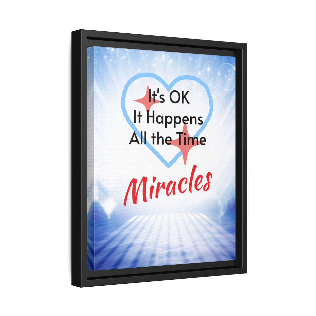 Framed canvas wall art with “Miracles Happen” design, inspirational message "It's OK, It Happens All the Time - Miracles," black pinewood frame, coated cotton-poly canvas, ready to hang, 11x14 framed wall art