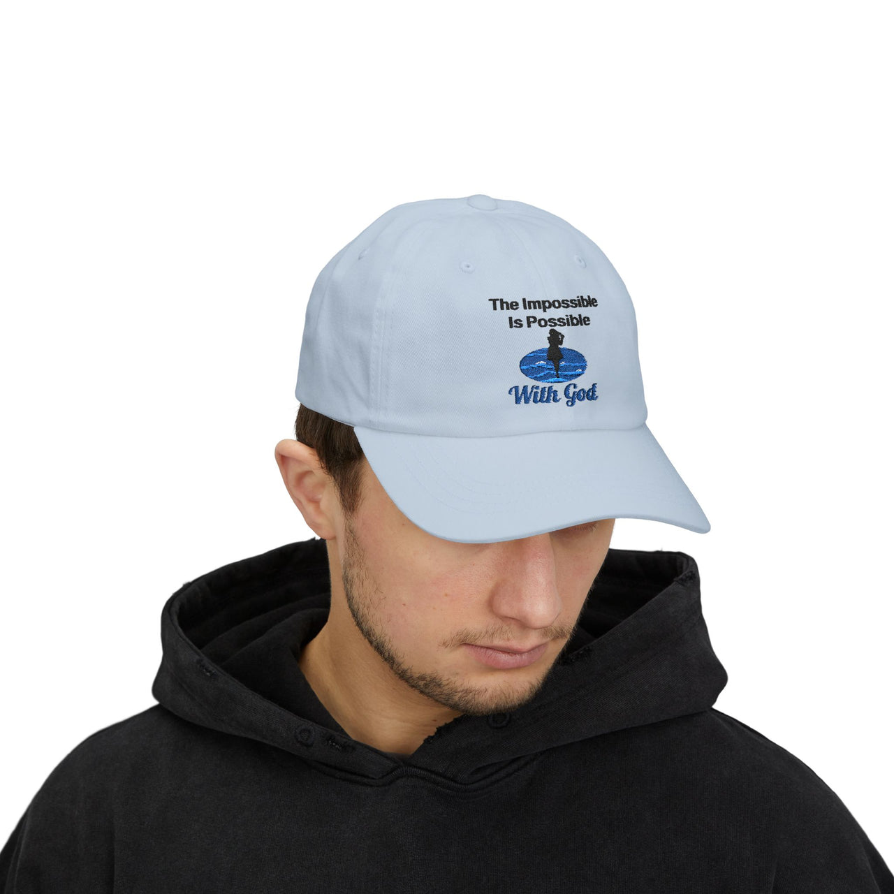 Classic cotton baseball cap with "Impossible Woman" design, message “The Impossible Is Possible with God,” adjustable fit, spiritual hat for women of purpose, man wearing light blue cap