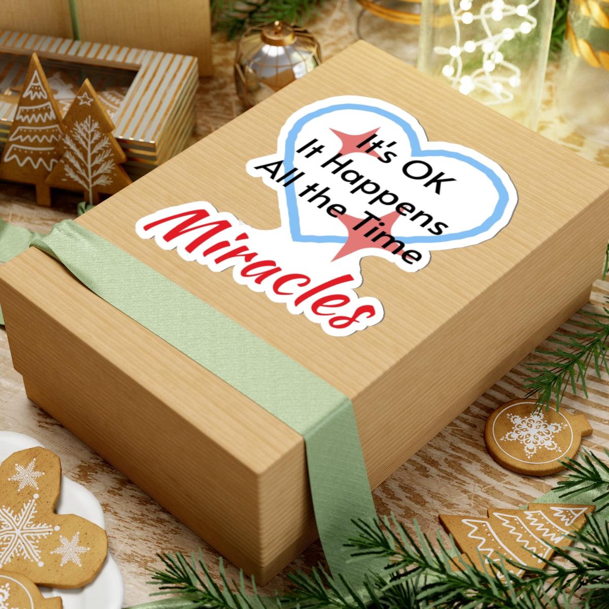 Large vinyl sticker with “Miracles Happen” design, message “It’s OK. It Happens All the Time – Miracles,” glossy finish, faith-based sticker are daily reminders of God’s tangible goodness, 6-inch sticker on gift box
