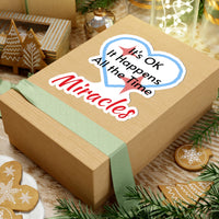Large vinyl sticker with “Miracles Happen” design, message “It’s OK. It Happens All the Time – Miracles,” glossy finish, faith-based sticker are daily reminders of God’s tangible goodness, 6-inch sticker on gift box