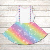 Pink girl's sundress with unicorn kitty and rainbow design, “Never Stop Dreaming” message, part of Paisley’s Treasure Chest Collection, lightweight polyester-spandex blend, ideal for summer and special occasions, back of unicorn kitty sundress