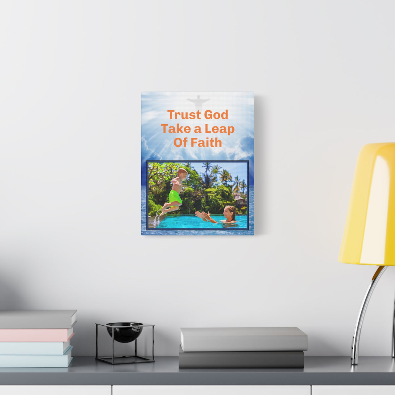 Canvas wall art with “Leap of Faith” design child jumping into pool with the message "Trust God, Take a Leap of Faith," pinewood frame, inspirational décor, ready to hang, 11x14 wall art on wall