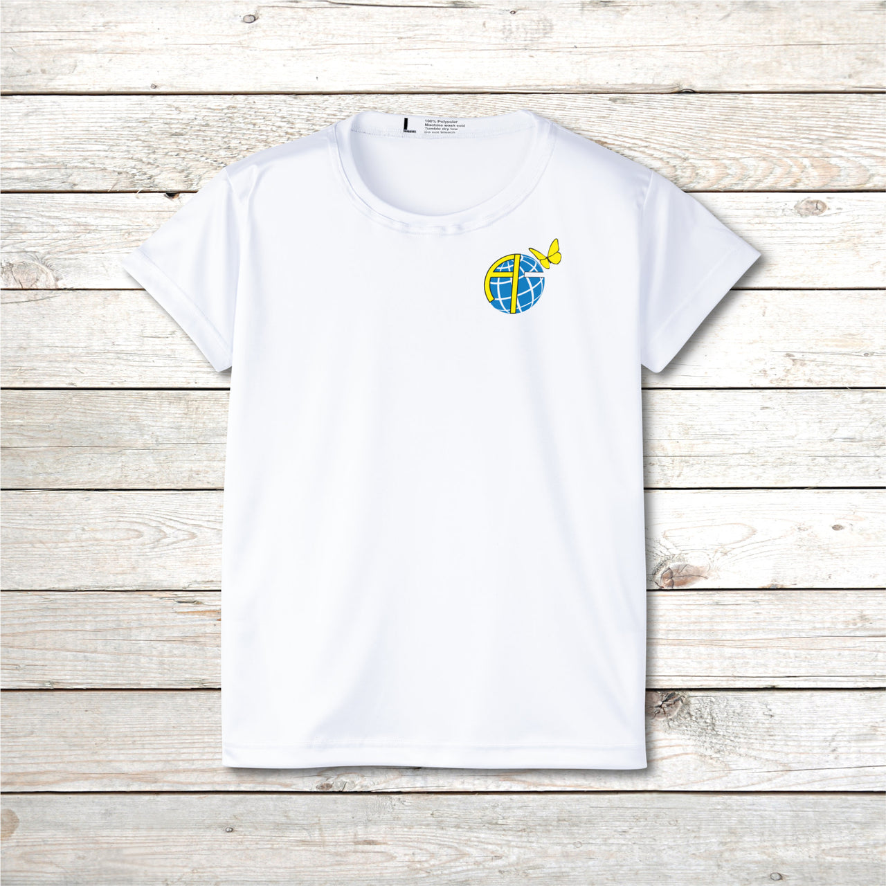Women’s sport jersey with Anakainoo International logo, breathable moisture-wicking fabric with globe and butterfly design symbolizing spiritual transformation and renewal through intimacy with God, white sports jersey