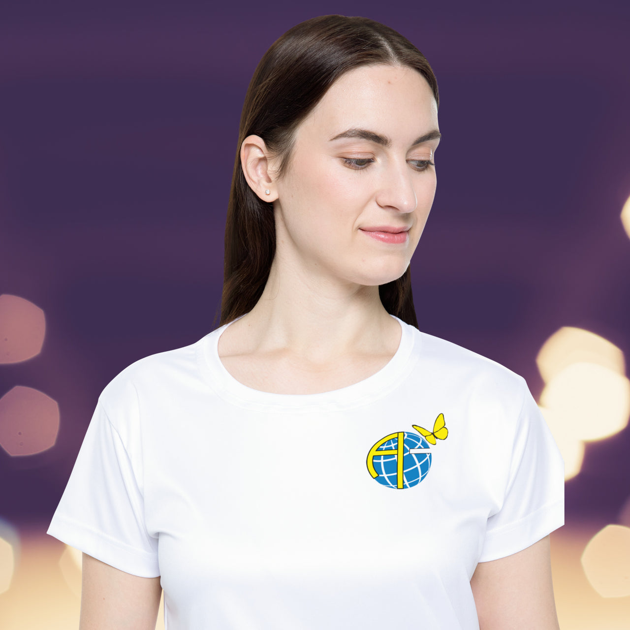 Women’s sport jersey with Anakainoo International logo, breathable moisture-wicking fabric with globe and butterfly design symbolizing spiritual transformation and renewal through intimacy with God, close-up of logo on white sports jersey