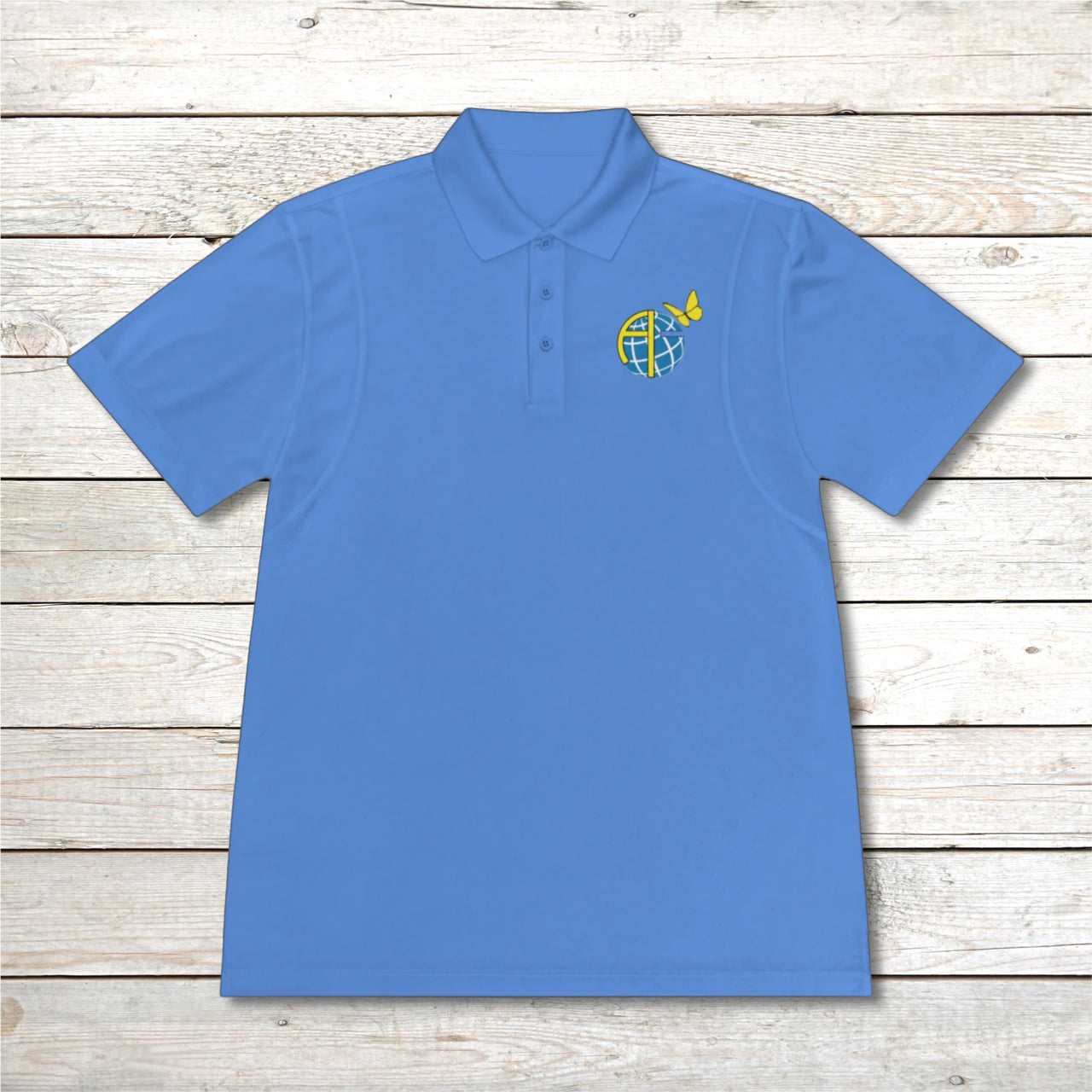 Men’s Sport-Tek polo shirt with Anakainoo International logo, moisture-wicking polyester with globe and butterfly design symbolizing spiritual renewal and transformation through intimacy with God, light-blue polo shirt