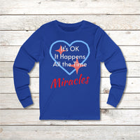 Long-sleeve Bella+Canvas t-shirt made from preshrunk ring-spun cotton with “Miracles Happen” design and message, “It’s OK. It Happens All the Time – Miracles,” faith-based apparel encouraging daily miracles through intimacy with God, front of blue long-sleeve t-shirt