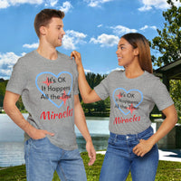 Soft, breathable Bella+Canvas t-shirt made from preshrunk cotton with “Miracles Happen” design message, “It’s OK. It Happens All the Time – Miracles,” inspirational shirt encouraging intimacy with God that produces everyday miracles, couple in gray shirt