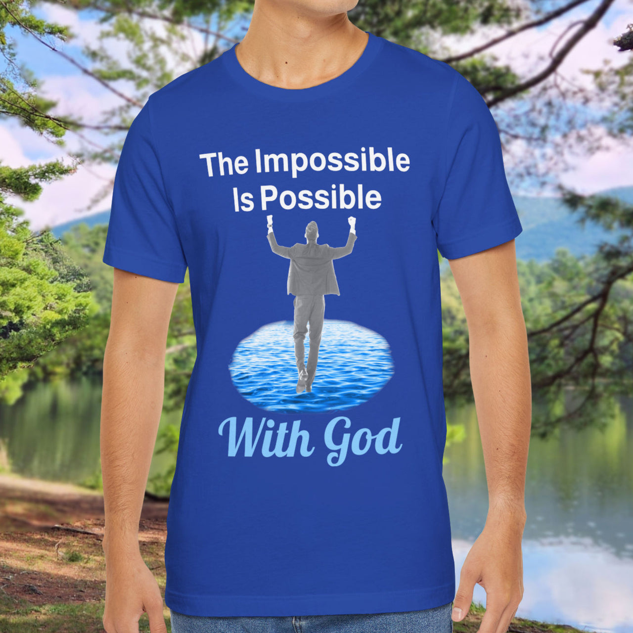Soft, breathable Bella+Canvas t-shirt made from preshrunk cotton with “Impossible Man” design message, “The Impossible Is Possible with God,” inspirational shirt encouraging bold faith to step out and follow God into the impossible, man in blue t-shirt 