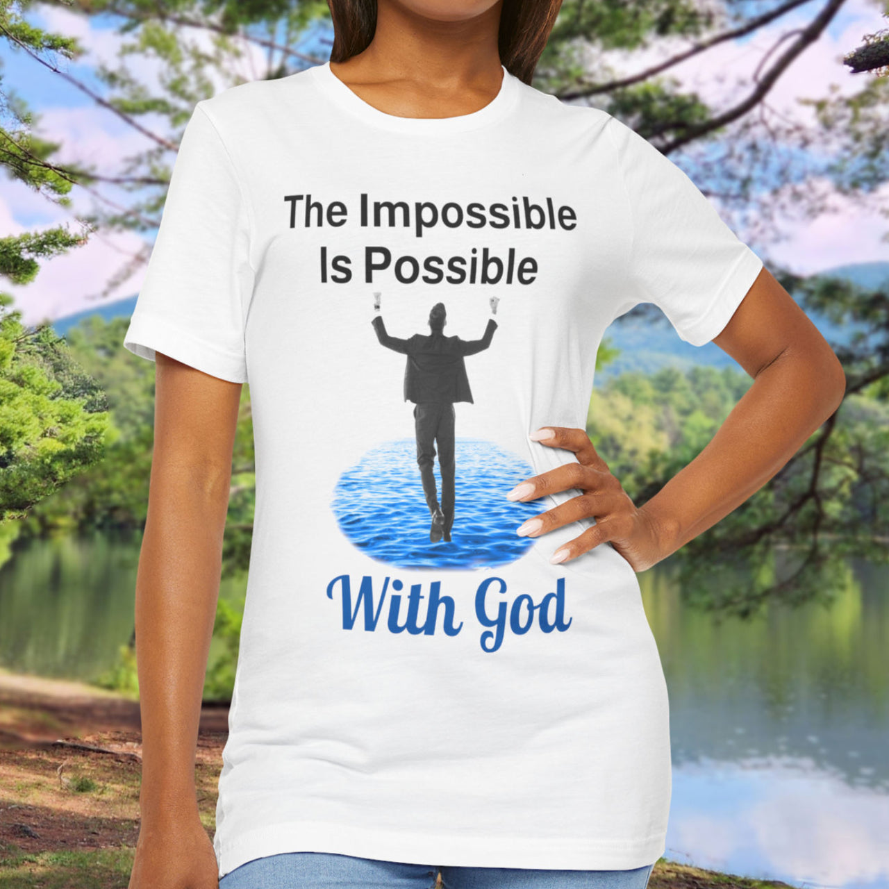 Soft, breathable Bella+Canvas t-shirt made from preshrunk cotton with “Impossible Man” design message, “The Impossible Is Possible With God,” inspirational shirt encouraging bold faith to step out and follow God into the impossible, woman in white t-shirt