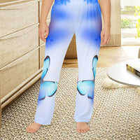 Girls’ butterfly lounge pants with blue butterfly and garden design, soft brushed polyester, elastic waistband, part of Paisley’s Corner Collection, ideal for sleepovers and cozy home wear, girl in butterfly lounge pants