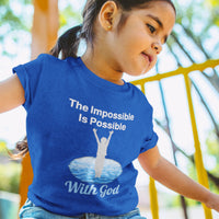 Bella+Canvas toddler t-shirt with “Impossible Toddler” design and faith-filled message, soft cotton, breathable and durable, Christian apparel for active toddlers and family matching, toddler girl in blue t-shirt