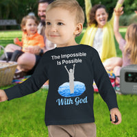 Rabbit Skins toddler long-sleeve t-shirt with “Impossible Toddler” design and faith-filled message, soft cotton, breathable and durable, Christian apparel for active toddlers and spiritual encouragement, toddler boy in black shirt