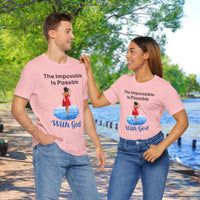 Soft, breathable Bella+Canvas t-shirt made from preshrunk cotton with “Impossible Woman” design message, “The Impossible Is Possible with God,” inspirational shirt encouraging bold obedience and faith-filled movement with God, couple in matching pink t-shirts