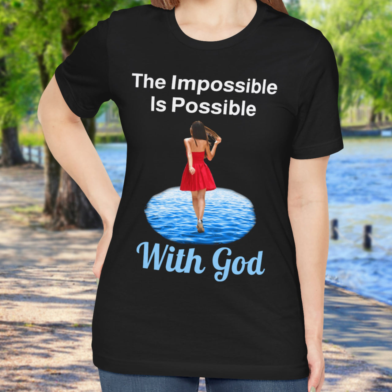 Soft, breathable Bella+Canvas t-shirt made from preshrunk cotton with “Impossible Woman” design message, “The Impossible Is Possible with God,” inspirational shirt encouraging bold obedience and faith-filled movement with God, woman in black t-shirt