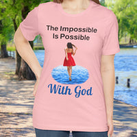 Soft, breathable Bella+Canvas t-shirt made from preshrunk cotton with “Impossible Woman” design message, “The Impossible Is Possible with God,” inspirational shirt encouraging bold obedience and faith-filled movement with God, woman in pink t-shirt