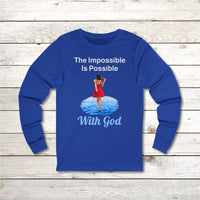 Long-sleeve Bella+Canvas t-shirt made from preshrunk ring-spun cotton with “Impossible Woman” design message, “The Impossible Is Possible with God,” inspirational apparel encouraging women to walk freely in God's incredible ways, front blue long-sleeve t-shirt