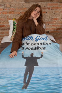 Faith-based plush blanket with “Impossible Man” design, man walking on water,  inspirational message 