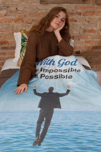 Faith-based plush blanket with “Impossible Man” design, man walking on water,  inspirational message 