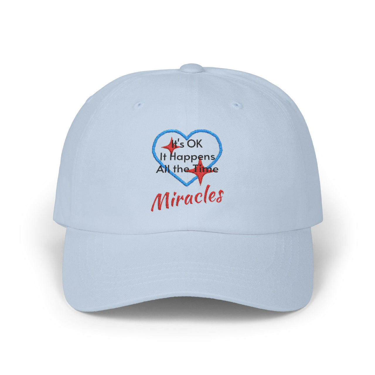 Classic cotton baseball cap with "Miracles Happen" design, message “It’s OK. It Happens All the Time – Miracles,” adjustable fit, spiritual hat for everyday encouragement, light blue cap